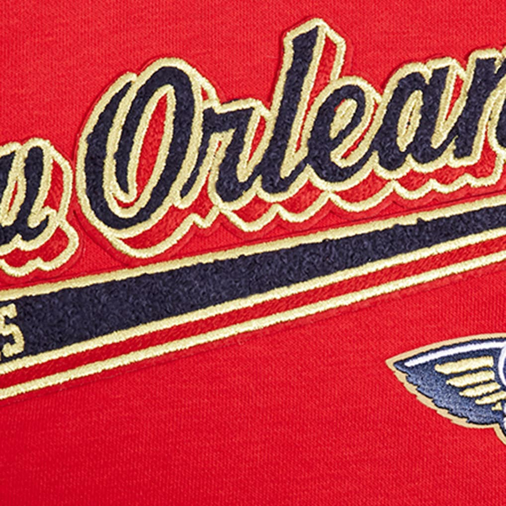 New Orleans Pelicans Pro Standard Women's Script Tail Cropped Pullover Hoodie - Red shop