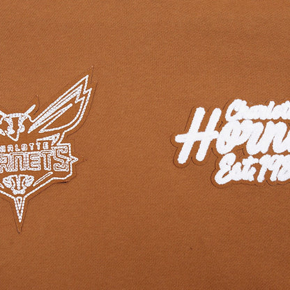 Charlotte Hornets Pro Standard Paint the City Drop Shoulder Pullover Hoodie - Brown discount